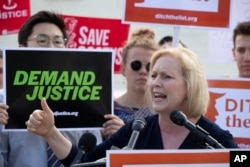Sen. Kirsten Gillibrand, D-N.Y., joins activists at the Supreme Court as President Donald Trump prepares to choose a replacement for Justice Anthony Kennedy, in Washington, June 28, 2018.