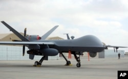 FILE - A U.S. MQ-9 drone is seen at Kandahar Airfield, Afghanistan, Jan. 23, 2018.