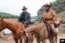 Left to right: Jeff Bridges plays Rooster Cogburn and Matt Damon plays LaBeouf in Paramount Pictures’ “True Grit.”