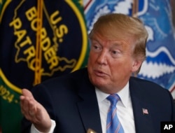 FILE - President Donald Trump participates in a round-table on immigration and border security at the U.S. Border Patrol Calexico Station in Calexico, Calif., April 5, 2019.