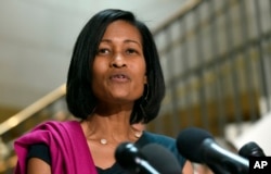 FILE - Cheryl Mills speaks to reporters on Capitol Hill in Washington, Sept. 3, 2015.