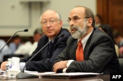 On July 22, 2010, Bureau of Ocean Energy Management, Regulation and Enforcement Director Michael Bromwich testified before the House Oversight and Government Reform Committee on Capitol Hill. At left is US Interior Secretary Ken Salazar.