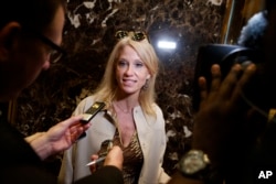 Kellyanne Conway, campaign manager for President-elect Donald Trump, talks with reporters as she arrives at Trump Tower, Nov. 14, 2016, in New York.