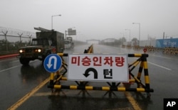 A South Korean military vehicle crosses Unification Bridge, which leads to the demilitarized zone, near the border village of Panmunjom in Paju, South Korea, May 16, 2018.
