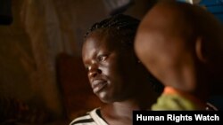 Fatma W. with her 7-year old son born from rape. She said her neighbors stigmatize her son because he was born from rape.