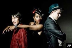 Auriol Hays with two members of her highly acclaimed band