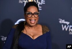 Oprah Winfrey arrives at the world premiere of "A Wrinkle in Time" at the El Capitan Theatre in Los Angeles, Feb. 26, 2018.