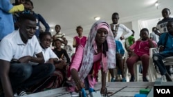 Students test at their robot at the 2017 Pan-African Robotics Competition in Dakar, Senegal, May 19, 2017. (R. Shryock/VOA)
