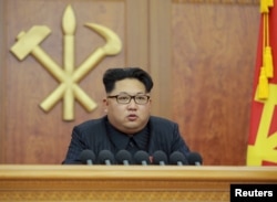 FILE - In his New Year's address, Kim Jong Un called for improved ties with Seoul, sparking speculation that he might pursue a conciliatory course as part of preparations for a major party convention in May.