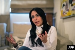 Venezuelan opposition deputy Delsa Solorzano gestures as she speaks during an interview with AFP in Caracas, Jan. 2, 2019.