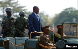 FILE - Burundi's President Pierre Nkurunziza arrives for an independence day celebration in Bujumbura, July 1, 2017.