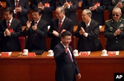 Chinese President Xi Jinping arrives for the opening session of China's 19th Party Congress at the Great Hall of the People in Beijing, Wednesday, Oct. 18, 2017.