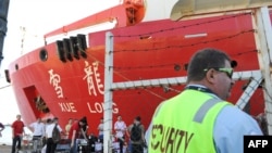 Chinese Antarctic research icebreaker Xue Long prepares to depart Fremantle Habor on March 21, 2014, as at least seven Chinese ships are reported to head for the southern Indian Ocean, where possible debris from a missing Malaysia Airlines MH370 plane has