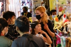 FILE - Australian actor Nicole Kidman works on a scene during filming for the Amazon Prime series "Expats" in Hong Kong, China, August 23, 2021.