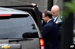 Deputy Attorney General Rod Rosenstein leaves the White House in Washington, Sept. 24, 2018.