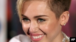 Recording artist Miley Cyrus attends an album release signing event, on Oct. 8, 2013 at Planet Hollywood in New York.