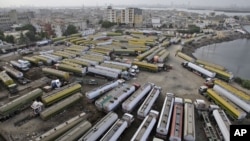 Oil tankers, which were used to transport NATO fuel supplies to neighboring Afghanistan, are parked in a compound in Karachi, Pakistan, June 11, 2012.