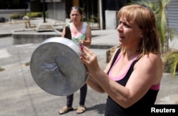 A protester is seen during the blackout in Caracas, Venezuela, March 31, 2019.