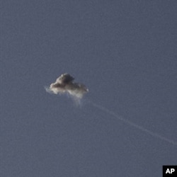 A rocket fired from Gaza is intercepted by Israel's Iron Dome short-range missile defence system over the city of Ashkelon on April 7, 2011.