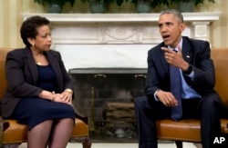 FILE - President Barack Obama meets with Attorney General Loretta Lynch at the White House Oval Office, May 29, 2015.