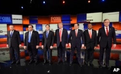 Republican presidential candidates take the stage before the Republican presidential debate at the North Charleston Coliseum, Jan. 14, 2016, in North Charleston, S.C.