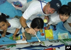 Wyland spent more than two decades painting 100 marine murals in cities across the globe.