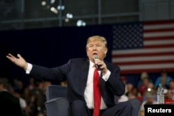 FILE - Republican presidential candidate Donald Trump addresses the crowd during a forum in Aiken, S.C., Dec. 12, 2015.