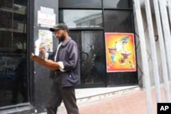 Parliament Street has been rejuvenated, but signs of its previous decay, such as this abandoned building-are still evident