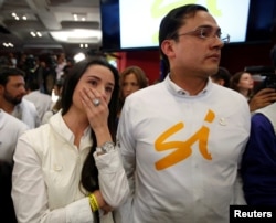 A supporter of cries after the nation voted "no" in a referendum on a peace deal between the government and Revolutionary Armed Forces of Colombia (FARC) rebels, at Bolivar Square in Bogota, Colombia, Oct. 2, 2016.