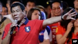 Philippine presidential race front-runner, Davao city mayor Rodrigo Duterte, gestures during his final campaign rally in Manila, Philippines, May 7, 2016. A surprise favorite, Duterte is surprise favorite. Duterte is known for his profanity-filled speeches against the government.
