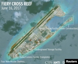 Construction is shown on Fiery Cross Reef in the Spratly Islands, the disputed South China Sea, in this June 16, 2017, satellite image released by CSIS Asia Maritime Transparency Initiative at the Center for Strategic and International Studies (CSIS) to Reuters on June 29, 2017.