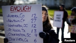 Gun control activists rally in front of the White House in Washington, Jan. 4, 2016.
