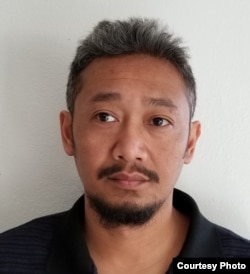 Sear Un is seen in this undated photo provided by his family.