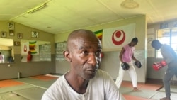 Zimbabwe's Mosquito Boxing School of Excellence with founder and coach Zvenyika Arifonso at his academy in Harare on Nov. 21, 2021. (Columbus Mavhunga/VOA)