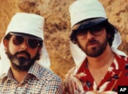 George Lucas and Steven Spielberg on the set of 'Raiders of the Lost Ark.' Both filmmakers say Norman Rockwell influenced their storytelling.