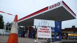 A fuel station stands closed amid a fuel shortage, in London, Sept. 30, 2021.