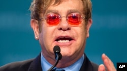 Sir Elton John speaks at the XIX International Aids Conference, July 23, 2012, in Washington.