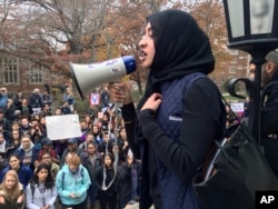 Muslim student Eeman Abbasi speaks during a protest on the University of Connecticut campus in Storrs against the election of Republican Donald Trump as president, Nov. 9, 2016.