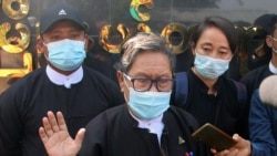 Khin Maung Zaw (C), a lawyer representing detained Myanmar civilian leader Aung San Suu Kyi and ousted president Win Myint, is pictured outside Zabuthiri Township Court in Naypyidaw on February 16, 2021. (Photo by STR / AFP)