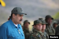 Venezuela's President Nicolas Maduro attends a military exercise in Turiamo, Venezuela, Feb. 3, 2019. (Miraflores Palace/Handout via Reuters)