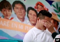 FILE - Christian, from Honduras, recounts his separation from his child at the border during a news conference at the Annunciation House,in El Paso, Texas, June 25, 2018.