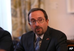 FILE - U.S. Ambassador John Bass attends a news conference in Ankara, Turkey, Oct. 11, 2017.