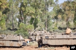 An Israeli soldier stands at a gathering point in Israel Gaza Border, May 6, 2019. The Israeli army on Monday lifted protective restrictions on residents in southern Israel, while the Hamas radio station in the Gaza Strip reported a cease-fire.