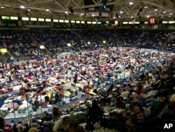 Evacuees fill Germain Arena, which is being used as a fallout shelter, in advance of Hurricane Irma, in Estero, Florida, Sept. 9, 2017.