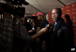 FILE - Don Cheadle talks about "Miles Ahead" during the 2016 Sundance Film Festival in Park City, Utah, Jan. 22, 2016.