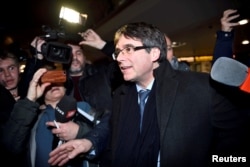 Catalan separatist leader Carles Puigdemont arrives at Copenhagen Airport, Denmark, Jan. 22, 2018.