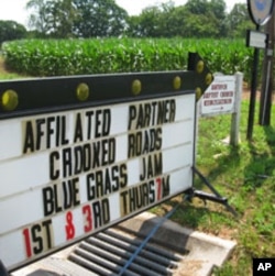 This sign along Route 40 in Franklin County, one of many along The Crooked Road, directs people to a nearby bluegrass jam.