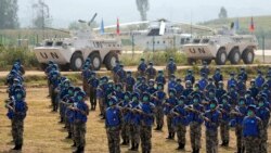 Pasukan PBB China mengambil bagian dalam latihan "Shared Destiny 2021" di pangkalan pelatihan Operasi Penjaga Perdamaian Queshan di Kabupaten Queshan, provinsi Henan, China tengah, Rabu, 15 September 2021. (AP)