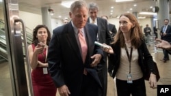Sen. Richard Burr, R-N.C., chairman of the Senate Select Committee on Intelligence, arrives as House and Senate lawmakers from both parties gather for a classified briefing in a secure room about the federal investigation into President Donald Trump's 2016 campaign.