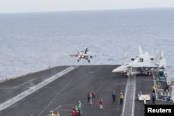A U.S. Navy F/A-18C Hornet launches from the flight deck of aircraft carrier USS Harry S. Truman in the Mediterranean Sea, June 3, 2016. U.S. Navy/Mass Communication Specialist 3rd Class Bobby J Siens/Handout via Reuters.